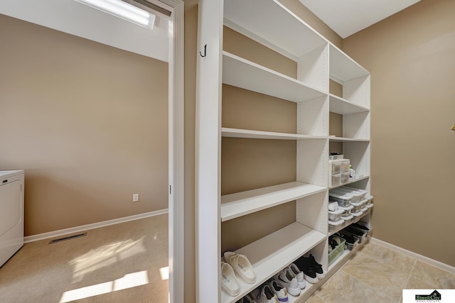 8420 Augusta Dr, Lincoln, NE 68526 - pantry featuring washer / dryer