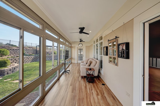 8420 Augusta Dr, Lincoln, NE 68526 - sunroom featuring wood finished floors and recessed lighting