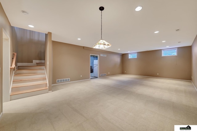 8420 Augusta Dr, Lincoln, NE 68526 - basement with recessed lighting, light colored carpet, stairs, and baseboards