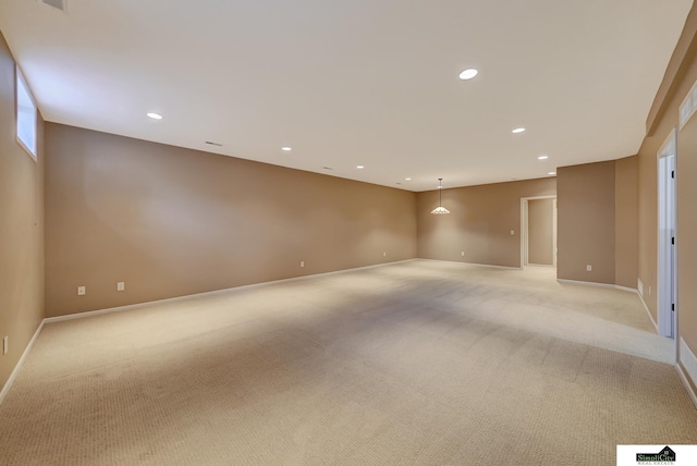 8420 Augusta Dr, Lincoln, NE 68526 - empty room featuring light carpet, recessed lighting, and baseboards