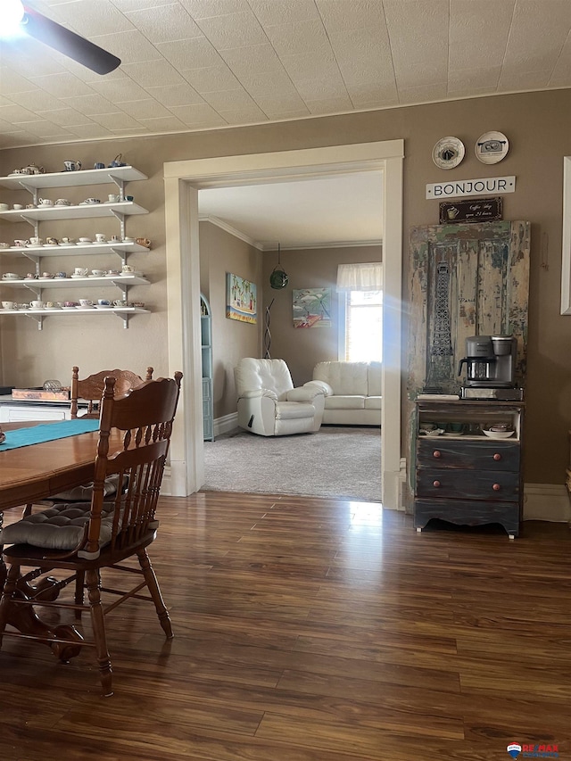 803 6th St, Fairbury, NE 68352 - dining room featuring wood finished floors, a ceiling fan, ornamental molding, and baseboards