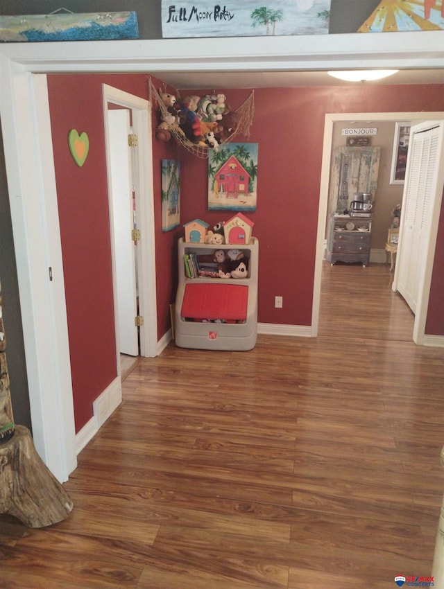 803 6th St, Fairbury, NE 68352 - hall with wood finished floors and baseboards