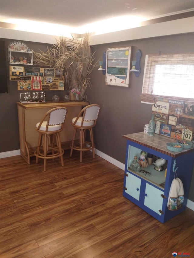 803 6th St, Fairbury, NE 68352 - indoor dry bar featuring wood finished floors and baseboards