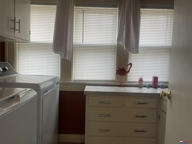 803 6th St, Fairbury, NE 68352 - laundry room featuring separate washer and dryer and cabinet space