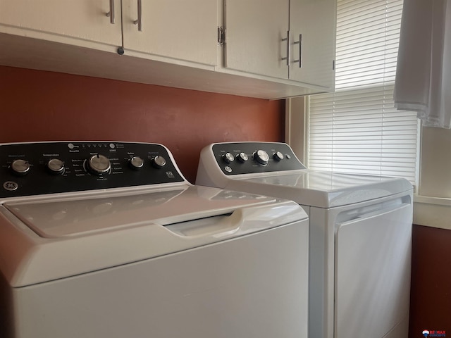 803 6th St, Fairbury, NE 68352 - laundry area featuring washer and clothes dryer and cabinet space