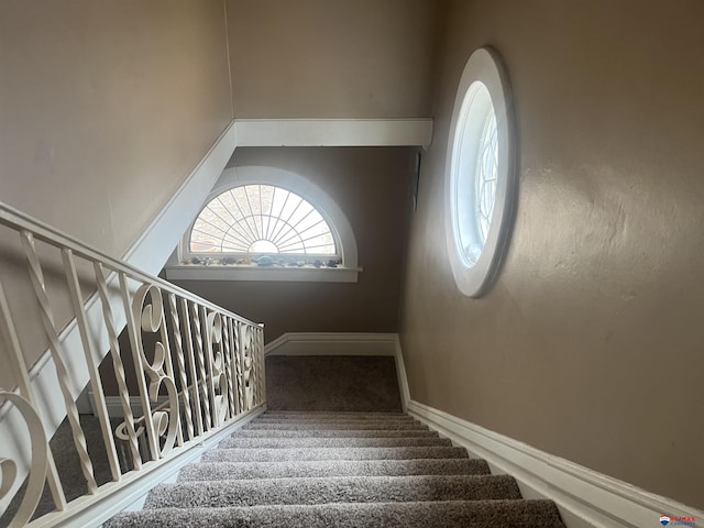 803 6th St, Fairbury, NE 68352 - staircase with carpet and baseboards