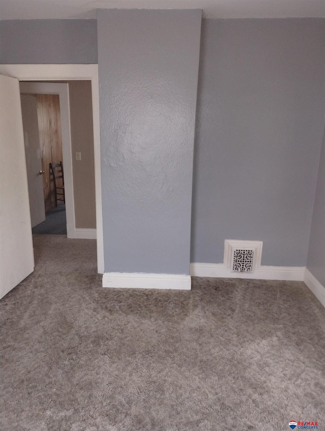 803 6th St, Fairbury, NE 68352 - spare room with carpet flooring and baseboards