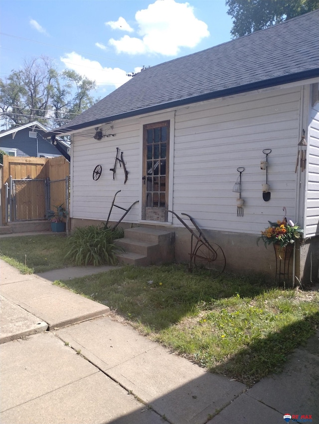 803 6th St, Fairbury, NE 68352 - view of front facade with roof with shingles and entry steps