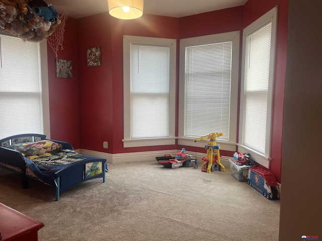 803 6th St, Fairbury, NE 68352 - game room with carpet and baseboards