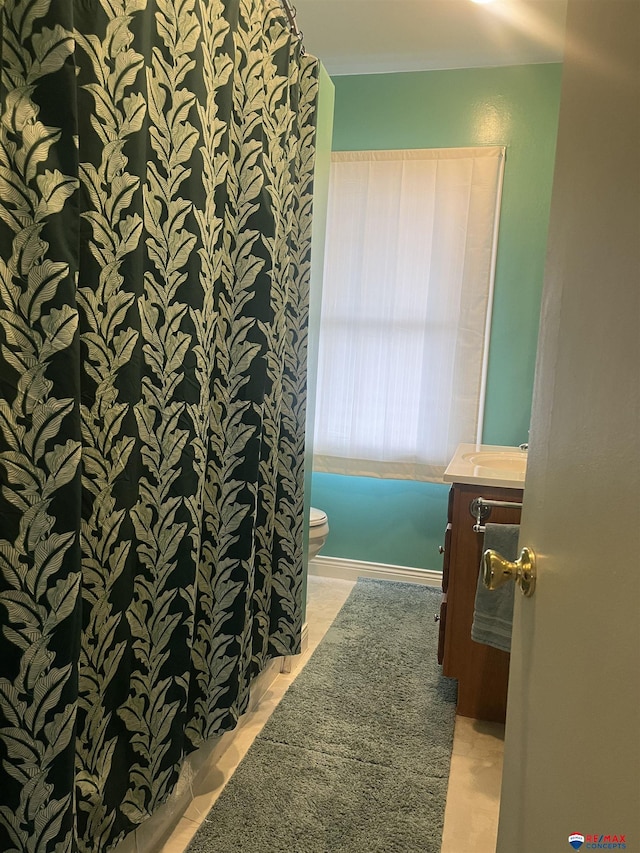 803 6th St, Fairbury, NE 68352 - bathroom with toilet and vanity