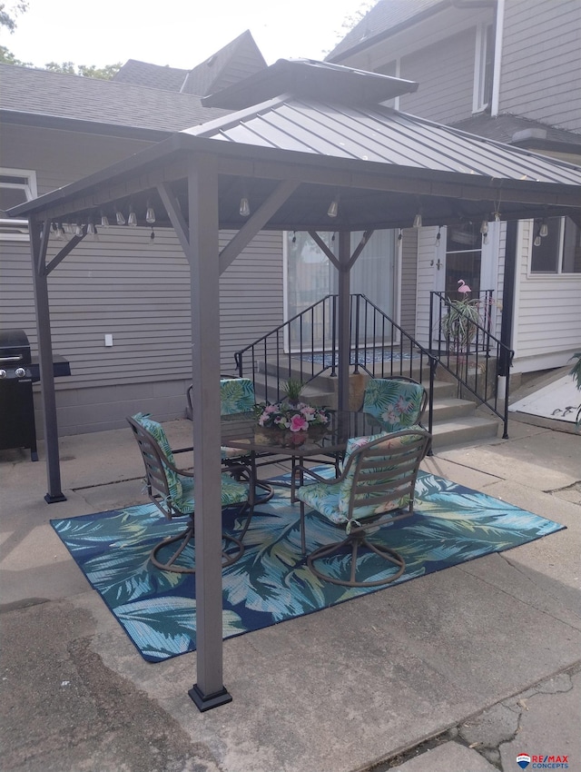 803 6th St, Fairbury, NE 68352 - view of patio / terrace featuring a gazebo and area for grilling