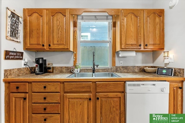 4188 Chicago St, Omaha, NE 68131 - kitchen featuring dishwasher, a sink, brown cabinets, and light countertops