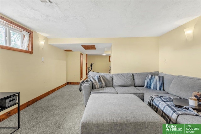 4188 Chicago St, Omaha, NE 68131 - carpeted living room featuring baseboards and a textured ceiling
