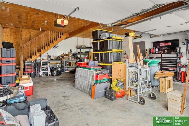 4188 Chicago St, Omaha, NE 68131 - garage with a garage door opener and a workshop area