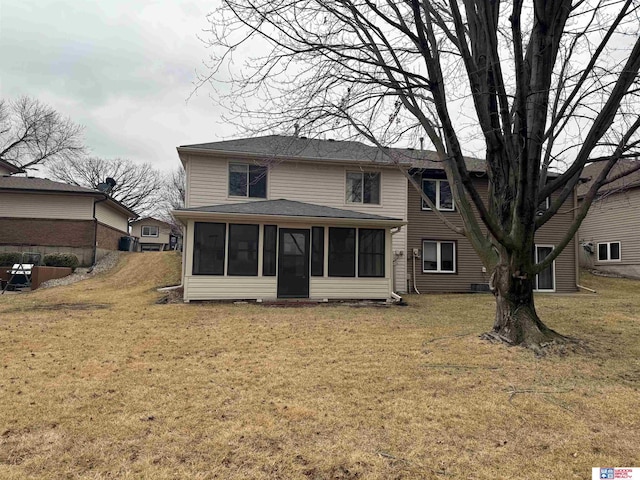 4932 High St, Lincoln, NE 68506 - rear view of house featuring a sunroom, a lawn, and a shingled roof