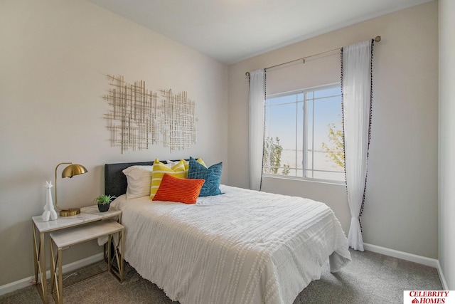 carpeted bedroom with baseboards