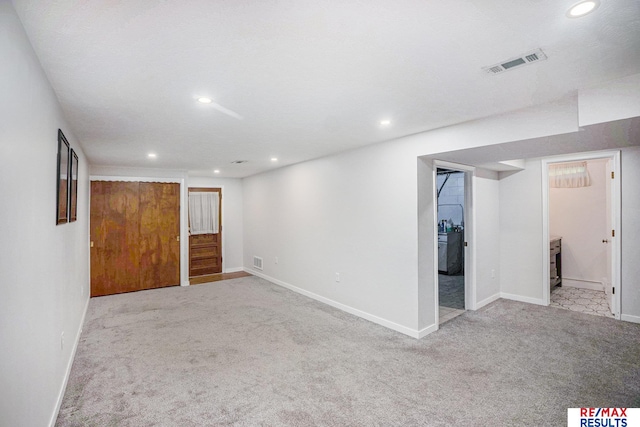 2137 S 49th St, Omaha, NE 68106 - finished below grade area with carpet flooring, recessed lighting, and baseboards