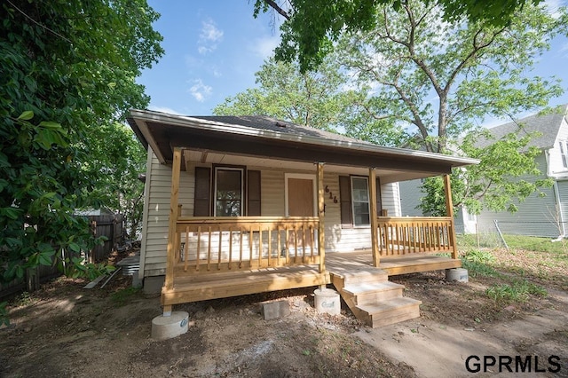 616 N 4th St, Beatrice, NE 68310 - view of front facade featuring a porch