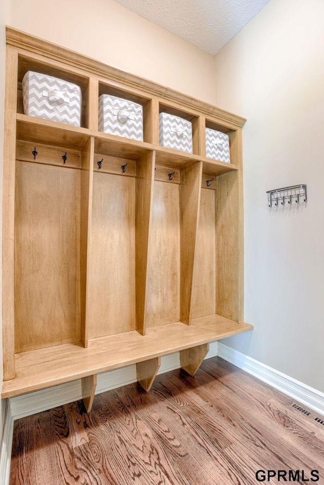 7320 S 169th St, Omaha, NE 68136 - mudroom with wood finished floors and baseboards