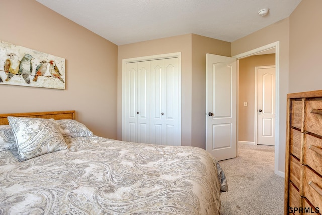 7320 S 169th St, Omaha, NE 68136 - bedroom featuring light carpet, a closet, and baseboards
