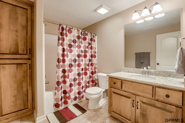 7320 S 169th St, Omaha, NE 68136 - bathroom with toilet, vanity, shower / tub combo, and tile patterned flooring