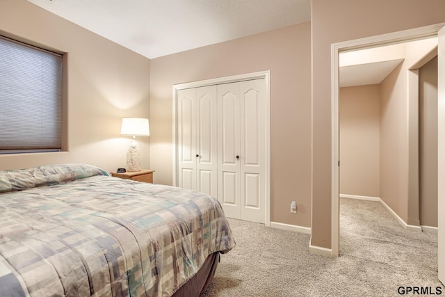7320 S 169th St, Omaha, NE 68136 - bedroom featuring carpet flooring, a closet, and baseboards