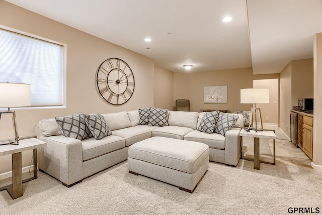 7320 S 169th St, Omaha, NE 68136 - living room with light carpet, recessed lighting, and baseboards