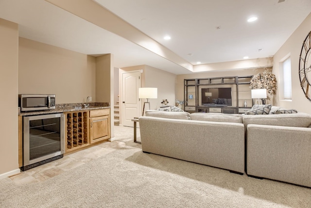 7320 S 169th St, Omaha, NE 68136 - living room featuring wine cooler, wet bar, recessed lighting, and light carpet