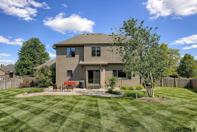 7320 S 169th St, Omaha, NE 68136 - rear view of property with entry steps and a patio area