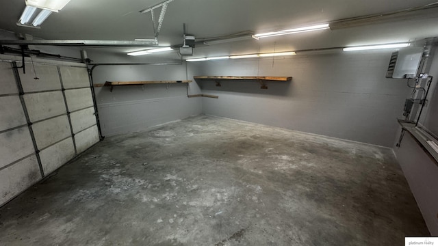garage featuring concrete block wall