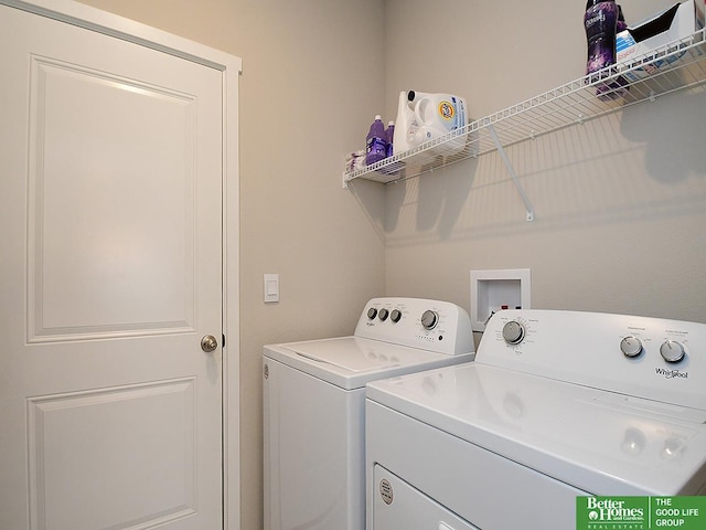 washroom with independent washer and dryer