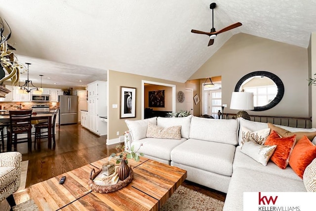 7815 Maui Cir, Papillion, NE 68046 - living area featuring a ceiling fan, dark wood-type flooring, a textured ceiling, vaulted ceiling, and baseboards