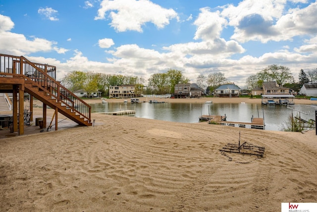 7815 Maui Cir, Papillion, NE 68046 - water view with stairs, nearby suburban area, and a boat dock