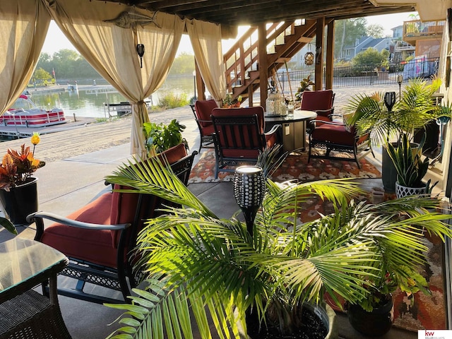 7815 Maui Cir, Papillion, NE 68046 - view of patio / terrace with a water view and stairs