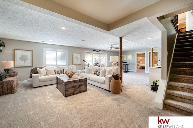 7815 Maui Cir, Papillion, NE 68046 - carpeted living room featuring stairway, a textured ceiling, baseboards, a ceiling fan, and recessed lighting