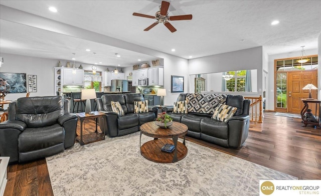 19882 Chicago St, Elkhorn, NE 68022 - living room featuring dark wood-style floors, ceiling fan, and recessed lighting
