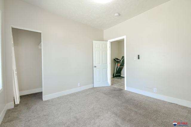 3021 N St, Lincoln, NE 68510 - unfurnished bedroom with carpet floors and baseboards