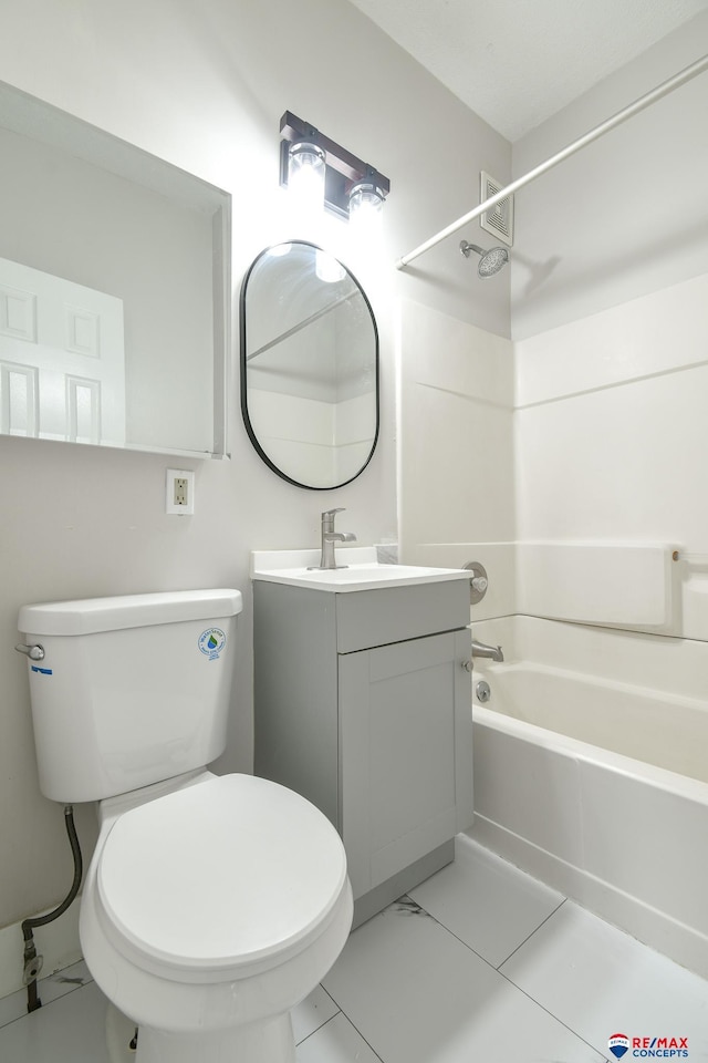 3021 N St, Lincoln, NE 68510 - bathroom with tub / shower combination, toilet, vanity, and marble look tile flooring