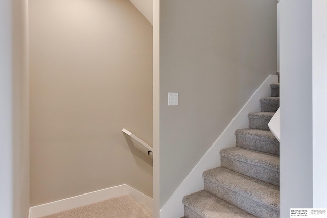 1917 Dahlman Rows Plz, Omaha, NE 68108 - stairs featuring carpet flooring