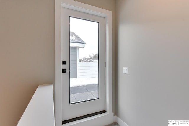 1917 Dahlman Rows Plz, Omaha, NE 68108 - doorway featuring baseboards