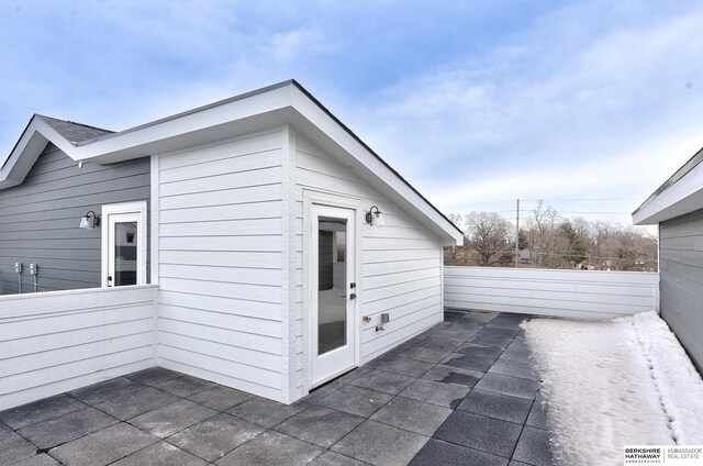 1917 Dahlman Rows Plz, Omaha, NE 68108 - view of side of home with a patio area