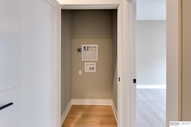 1921 Dahlman Rows Plz, Omaha, NE 68108 - laundry room featuring electric dryer hookup, washer hookup, baseboards, and light wood-type flooring