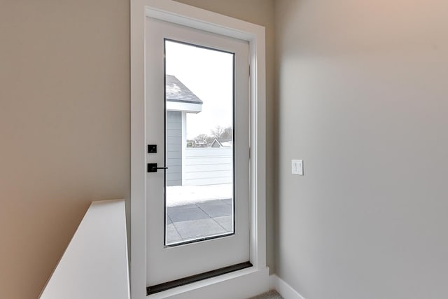 1921 Dahlman Rows Plz, Omaha, NE 68108 - entryway featuring baseboards