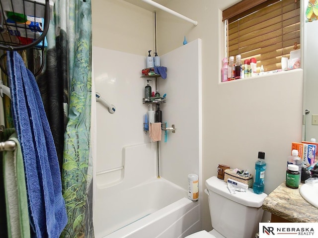 70 Switchgrass Ln, Bennet, NE 68317 - bathroom featuring toilet, shower / bathtub combination with curtain, and vanity