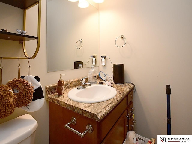 70 Switchgrass Ln, Bennet, NE 68317 - half bath featuring vanity and toilet