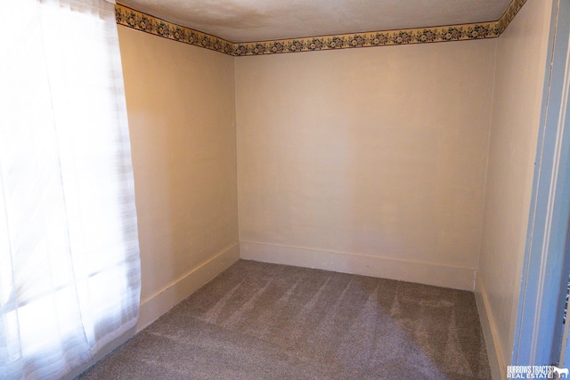 547 I St, Pawnee City, NE 68420 - empty room featuring carpet floors and baseboards