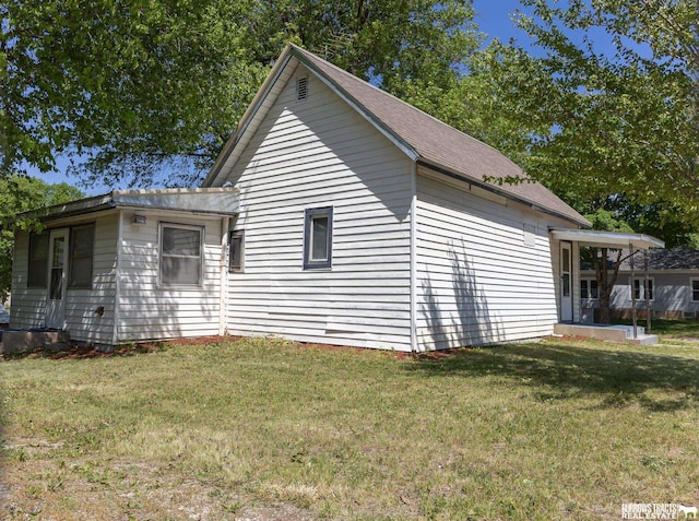 547 I St, Pawnee City, NE 68420 - view of side of property featuring a yard