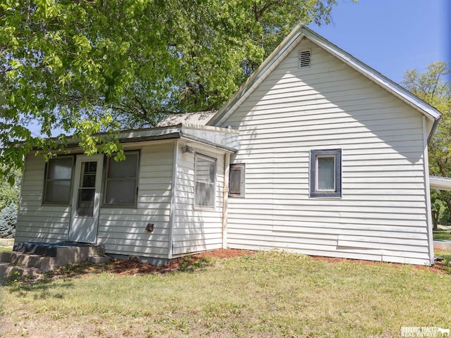 547 I St, Pawnee City, NE 68420 - view of property exterior with a yard