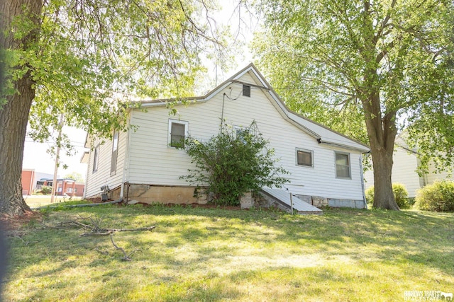 547 I St, Pawnee City, NE 68420 - view of home's exterior with a yard