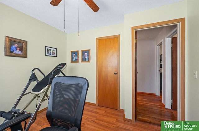 6070 Buckingham Ave, Omaha, NE 68117 - office space with wood finished floors, ceiling fan, and baseboards